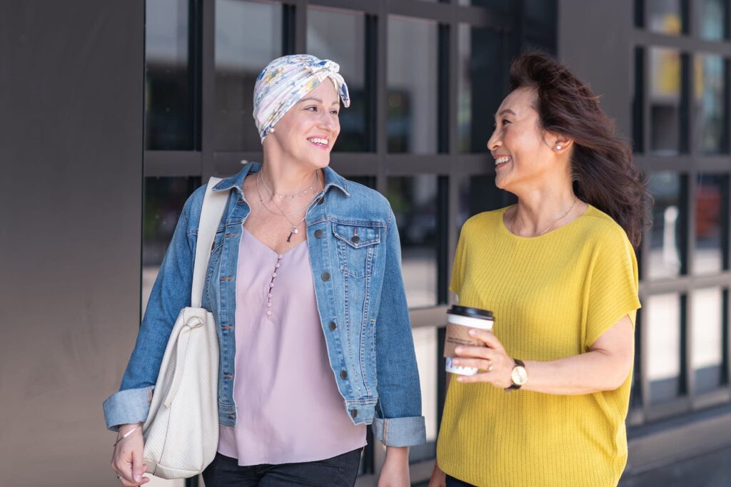 Two women walking and talking