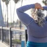 woman walking on pier picture